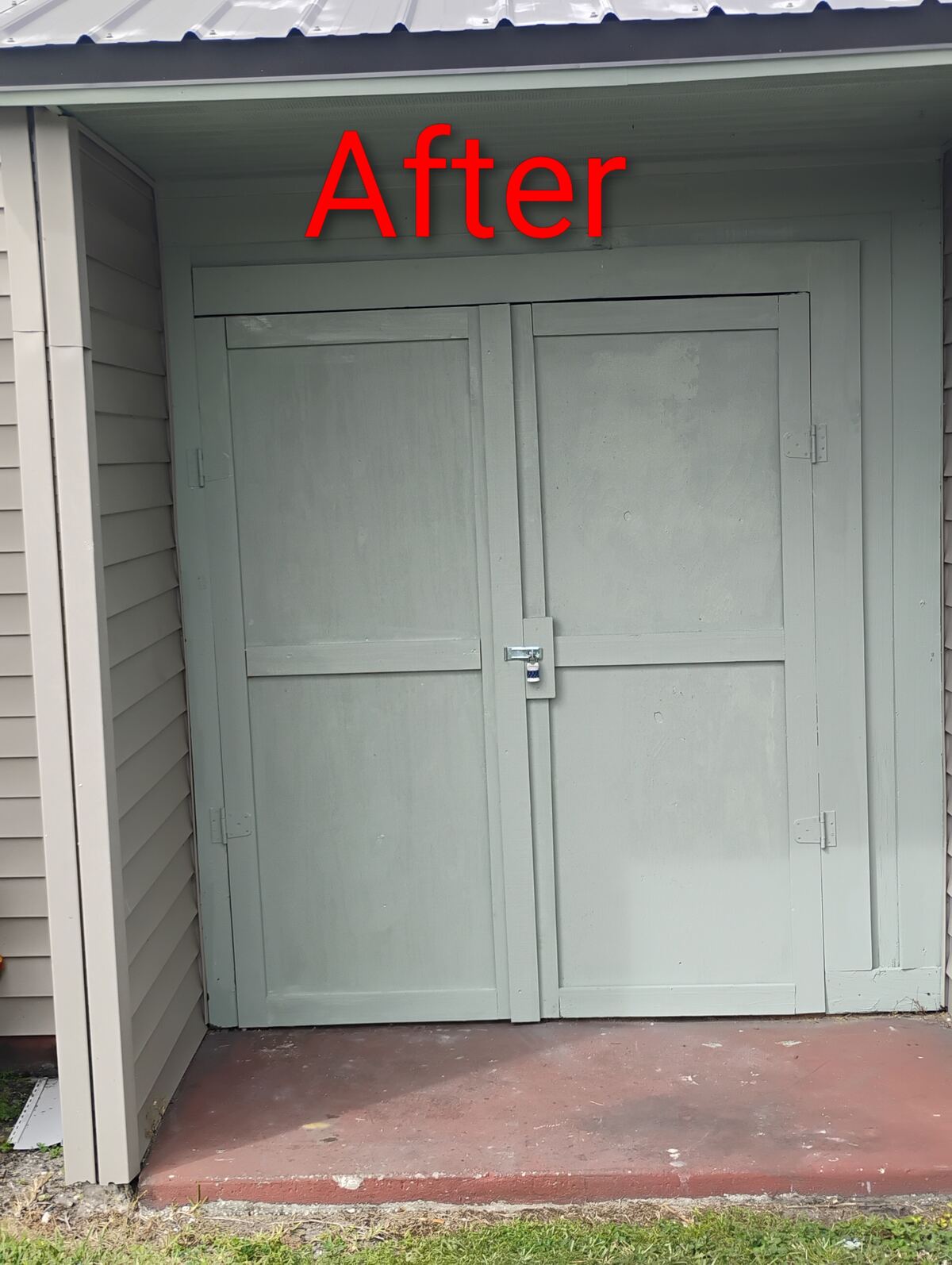 Storage shed after new doors and paint