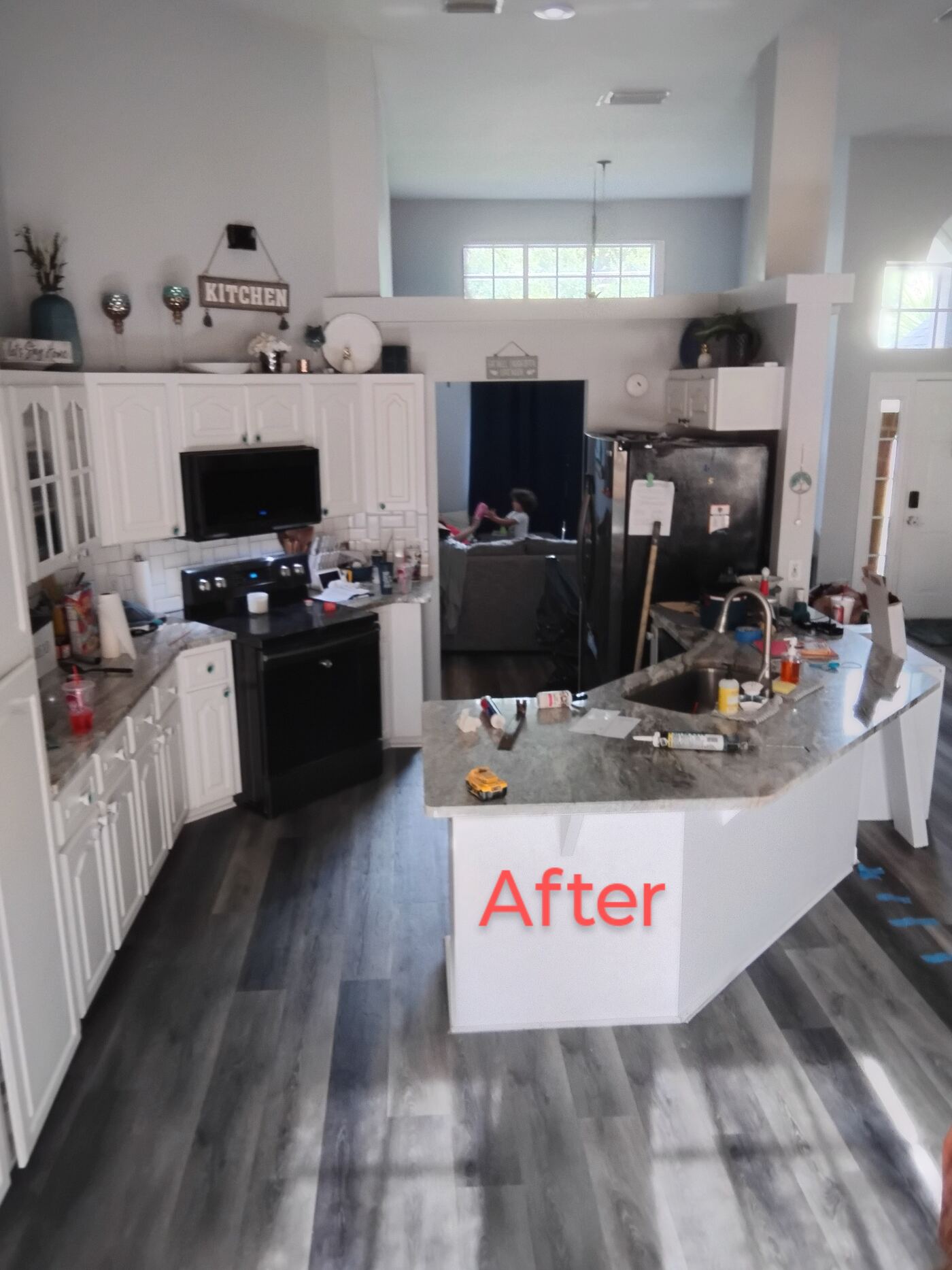 Remodeled kitchen with freshly painted white cabinets